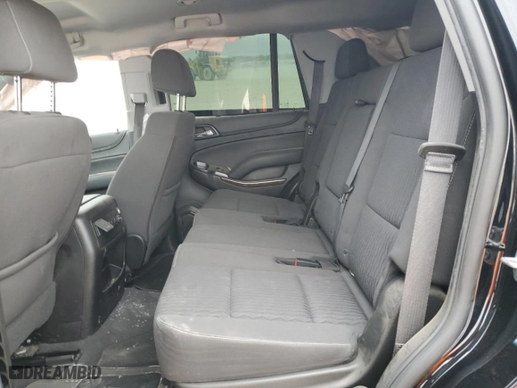 2019 Chevrolet Tahoe LS with VIN 1GNSCAKC6KR264360, listed as a Copart auction lot 87317684 with 72,476 mi miles and Salvage Title. Bid and sale history available at carsss.com. Image 12.