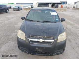 2009 Chevrolet Aveo LT w/1LT with VIN KL1TD56E09B626562, listed as a IAAI auction lot 41876182 with 108,496 mi miles. Bid and sale history available at carsss.com. Image 6.