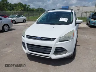 2013 Ford Escape SE with VIN 1FMCU0GX5DUA85464, listed as a IAAI auction lot 42452112 with 158,081 mi miles and . Bid and sale history available at DreamBid. Image 6.