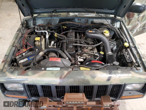 1998 Jeep Cherokee Sport with VIN 1J4FJ68S7WL269467, listed as a Copart auction lot 58664135 with 187,741 mi miles and Clean title. Bid and sale history available at DreamBid. Image 12.