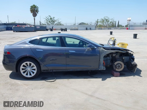 2016 Tesla Model S 90D with VIN 5YJSA1E22GF138236, listed as a IAAI auction lot 42532245 with 72,839 mi miles and . Bid and sale history available at DreamBid. Image 14.