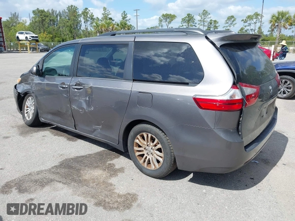 2015 Toyota Sienna XLE with VIN 5TDYK3DC3FS556859, listed as a IAAI auction lot 42161107 with 200,502 mi miles and . Bid and sale history available at DreamBid. Image 3.