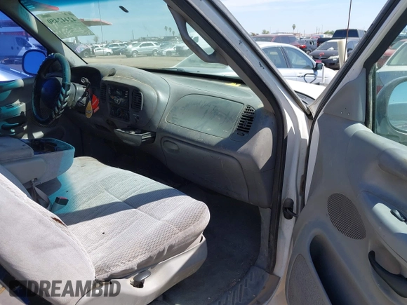 1997 Ford F-150 with VIN 1FTDX1764VKB98042, listed as a IAAI auction lot 42442450 with 203,620 mi miles and . Bid and sale history available at DreamBid. Image 5.