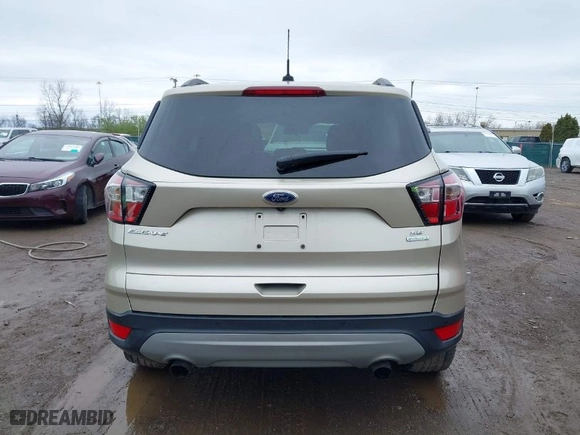 2017 Ford Escape SE with VIN 1FMCU0G99HUE68587, listed as a IAAI auction lot 41924307 with 89,609 mi miles. Bid and sale history available at carsss.com. Image 16.
