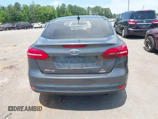 2018 Ford Focus SE with VIN 1FADP3FE2JL227679, listed as a IAAI auction lot 42296608 with 128,269 mi miles and . Bid and sale history available at DreamBid. Image 16.