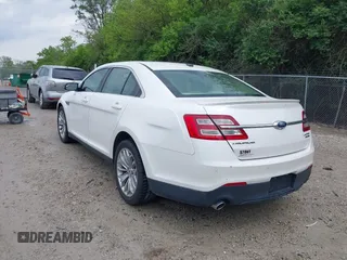 2014 Ford Taurus Limited with VIN 1FAHP2F82EG121267, listed as a IAAI auction lot 42377620 with 123,199 mi miles and . Bid and sale history available at DreamBid. Image 3.