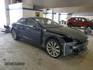 2014 Tesla Model S 60 with VIN 5YJSA1H10EFP52850, listed as a Copart auction lot 54321805 with 58,031 mi miles and Salvage Title. Bid and sale history available at DreamBid. Image 4.
