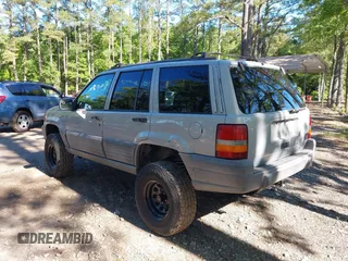 1998 Jeep Grand Cherokee Laredo with VIN 1J4GZ58S6WC154415, listed as a IAAI auction lot 42331831 with 163,723 mi miles and . Bid and sale history available at DreamBid. Image 3.