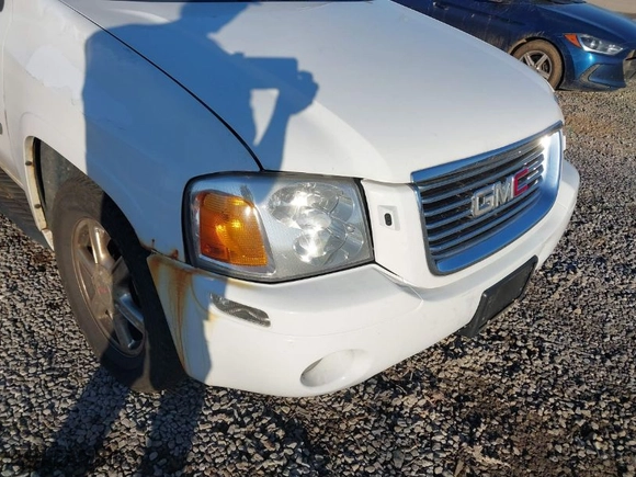 2006 GMC Envoy SLE with VIN 1GKDT13S662192005, listed as a IAAI auction lot 41483764 with 138,113 mi miles. Bid and sale history available at carsss.com. Image 13.