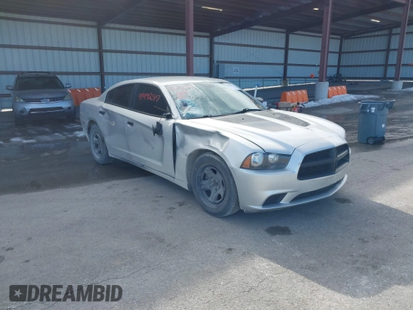 2013 Dodge Charger Police z VIN 2C3CDXAT1DH642347, wystawiony jako IAAI lot #41442517 z przebiegiem 193 232 mil mil oraz . Historia ofert i sprzedaży dostępna na DreamBid. Obrazek 1.
