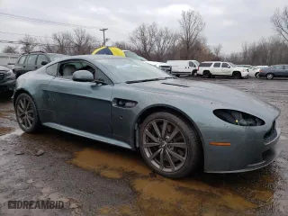 2015 Aston Martin V8 Vantage GT with VIN SCFEKBAL2FGC19020, listed as a Copart auction lot 46138035 with 34,752 mi miles and Salvage Title. Bid and sale history available at carsss.com. Image 4.