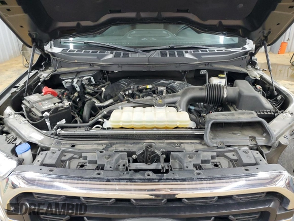 2021 Ford F-150 XL with VIN 1FTMF1EP7MKE58611, listed as a Copart auction lot 56912955 with 30,850 mi miles and Salvage title. Bid and sale history available at DreamBid. Image 11.