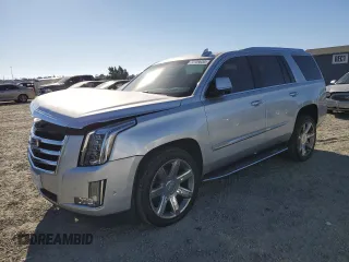 2020 Cadillac Escalade Luxury z VIN 1GYS4BKJ2LR127115, wystawiony jako Copart lot #70709034 z przebiegiem 88 210 mil mil oraz Szkoda całkowita • Salvage title. Historia ofert i sprzedaży dostępna na DreamBid. Obrazek 1.
