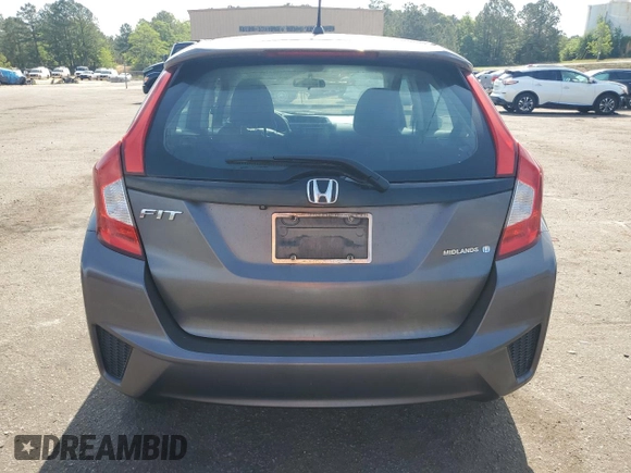 2015 Honda Fit LX с VIN 3HGGK5G53FM738521, выставлен на аукционе Copart как лот 54788525 с пробегом 122 152 миль миль и Списание • Salvage title. История ставок и продаж доступна на DreamBid. Изображение 6.