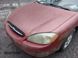 2001 Ford Taurus SE Standard with VIN 1FAFP58U91A290623, listed as a IAAI auction lot 41503243 with 117,194 mi miles and . Bid and sale history available at DreamBid. Image 13.