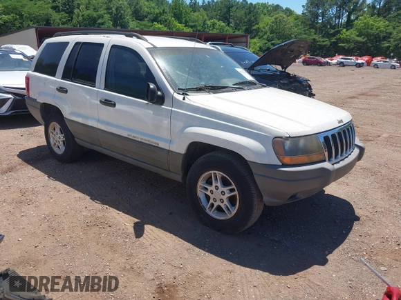 2002 Jeep Grand Cherokee Laredo with VIN 1J4GX48S32C134911, listed as a IAAI auction lot 42323138 with 156,852 mi miles and . Bid and sale history available at DreamBid. Image 1.