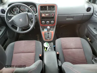 2011 Dodge Caliber Heat z VIN 1B3CB5HA4BD222393, wystawiony jako Copart lot #52901255 z przebiegiem 108 070 mil mil oraz Szkody całkowita. Historia ofert i sprzedaży dostępna na DreamBid. Obrazek 8.