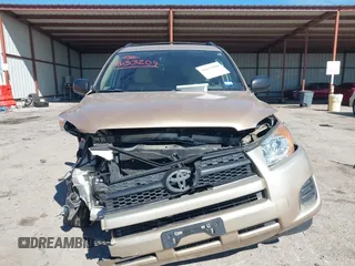 2009 Toyota RAV4 with VIN JTMZF33V995000660, listed as a IAAI auction lot 41633209 with 106,959 mi miles. Bid and sale history available at carsss.com. Image 12.