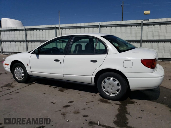 2002 Saturn SL z VIN 1G8ZH52882Z253088, wystawiony jako Copart lot #55062225 z przebiegiem 177 866 mil mil oraz Szkoda całkowita • Salvage title. Historia ofert i sprzedaży dostępna na DreamBid. Obrazek 2.