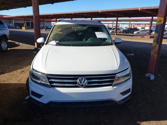 2018 Volkswagen Tiguan S with VIN 3VV1B7AX3JM091025, listed as a IAAI auction lot 41395912 with 58,840 mi miles. Bid and sale history available at carsss.com. Image 12.
