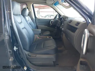 2006 Honda Ridgeline RTL with VIN 2HJYK16556H566886, listed as a IAAI auction lot 42077035 with 124,310 mi miles. Bid and sale history available at carsss.com. Image 5.