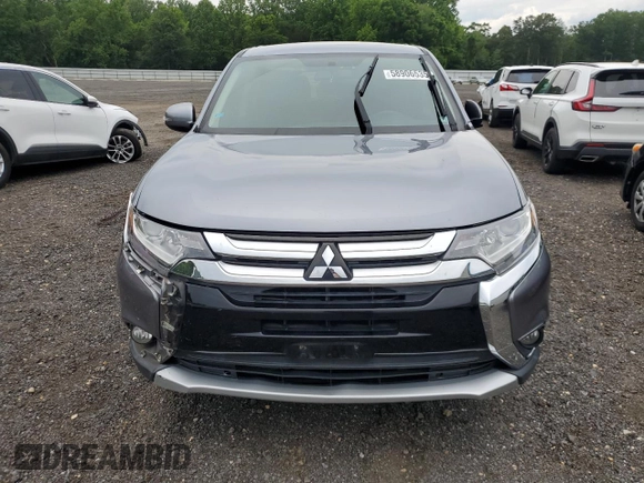 2018 Mitsubishi Outlander SE with VIN JA4AD3A36JZ016908, listed as a Copart auction lot 58906535 with 175,094 mi miles and Salvage title. Bid and sale history available at DreamBid. Image 5.