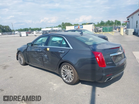 2014 Cadillac CTS Luxury AWD z VIN 1G6AX5SX7E0173466, wystawiony jako IAAI lot #42187266 z przebiegiem 115 140 mil mil oraz . Historia ofert i sprzedaży dostępna na DreamBid. Obrazek 3.