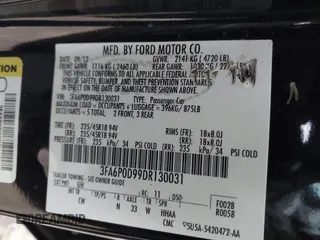 2013 Ford Fusion Titanium with VIN 3FA6P0D99DR130031, listed as a IAAI auction lot 41885596 with 174,687 mi miles. Bid and sale history available at carsss.com. Image 9.