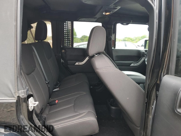 2016 Jeep Wrangler Unlimited Sahara with VIN 1C4BJWEG8GL150249, listed as a Copart auction lot 57574525 with 104,206 mi miles and Salvage title. Bid and sale history available at DreamBid. Image 11.