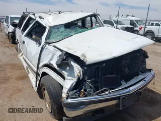 1999 GMC Suburban with VIN 1GDFK16R0XJ728255, listed as a IAAI auction lot 42230595 with Not provided miles and . Bid and sale history available at DreamBid. Image 1.
