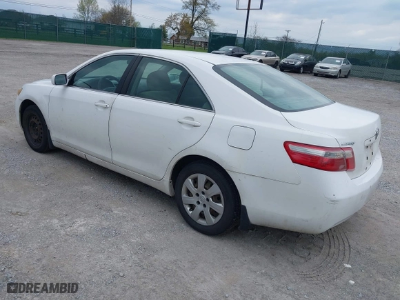 2007 Toyota Camry CE with VIN 4T1BE46KX7U664699, listed as a IAAI auction lot 42040572 with 201,624 mi miles. Bid and sale history available at carsss.com. Image 3.