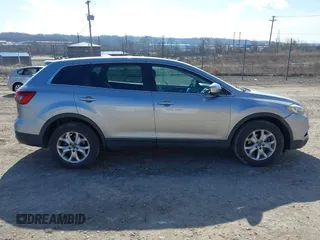 2015 Mazda CX-9 Sport with VIN JM3TB2BA6F0455539, listed as a IAAI auction lot 41839466 with 143,667 mi miles and . Bid and sale history available at carsss.com. Image 14.