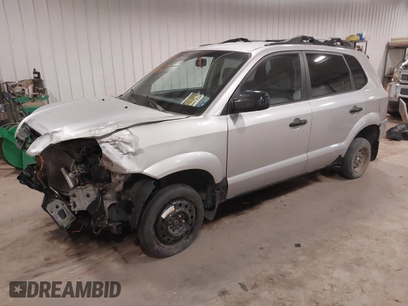 2006 Hyundai Tucson GL with VIN KM8JM12BX6U250937, listed as a IAAI auction lot 41529567 with 165,528 mi miles. Bid and sale history available at carsss.com. Image 2.