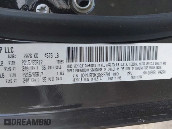 2014 Jeep Patriot Latitude with VIN 1C4NJRFBXED687701, listed as a IAAI auction lot 41399153 with 109,783 mi miles. Bid and sale history available at carsss.com. Image 9.