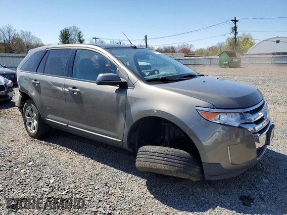 2014 Ford Edge SEL z VIN 2FMDK4JC7EBA36345, wystawiony jako Copart lot #53434145 z przebiegiem 184 955 mil mil oraz Szkoda całkowita • Salvage title. Historia ofert i sprzedaży dostępna na DreamBid. Obrazek 4.