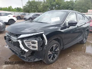2024 Mitsubishi Eclipse Cross SE with VIN JA4ATWAA4RZ034659, listed as a IAAI auction lot 42670533 with 33,398 mi miles and . Bid and sale history available at DreamBid. Image 2.