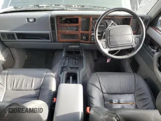 1995 Jeep Cherokee with VIN 1J4FN78SXSL617511, listed as a Copart auction lot 44650885 with 42,598 mi miles and Salvage title. Bid and sale history available at DreamBid. Image 8.