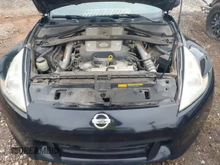2009 Nissan 370Z Touring with VIN JN1AZ44E69M404341, listed as a IAAI auction lot 41907551 with 144,612 mi miles and . Bid and sale history available at DreamBid. Image 10.