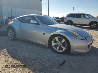 2010 Nissan 370Z Touring with VIN JN1AZ4EH1AM504859, listed as a Copart auction lot 87377564 with 98,765 mi miles and Salvage Title. Bid and sale history available at carsss.com. Image 4.
