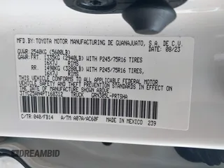 2023 Toyota Tacoma SR with VIN 3TYCZ5AN4PT168312, listed as a IAAI auction lot 42555775 with 8,288 mi miles and . Bid and sale history available at DreamBid. Image 9.