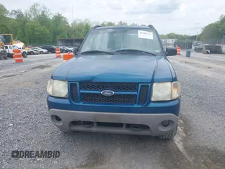 2001 Ford Explorer Sport Trac z VIN 1FMZU77E11UC71161, wystawiony jako IAAI lot #42184342 z przebiegiem 196 240 mil mil oraz . Historia ofert i sprzedaży dostępna na DreamBid. Obrazek 12.