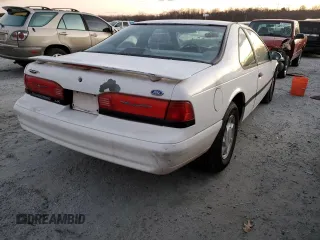 1995 Ford Thunderbird LX with VIN 1FALP62W3SH119037, listed as a Copart auction lot 41517485 with 164,133 mi miles and Salvage Title. Bid and sale history available at carsss.com. Image 3.