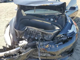 2019 Tesla Model 3 Mid Range z VIN 5YJ3E1EA8KF424584, wystawiony jako Copart lot #51331635 z przebiegiem 87 355 mil mil oraz Szkody całkowita. Historia ofert i sprzedaży dostępna na DreamBid. Obrazek 13.