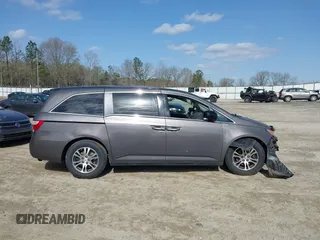 2013 Honda Odyssey EX-L with VIN 5FNRL5H62DB035649, listed as a IAAI auction lot 41849123 with 176,392 mi miles and . Bid and sale history available at carsss.com. Image 13.