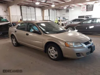 2004 Dodge Stratus SE with VIN 1B3EL36T44N139526, listed as a IAAI auction lot 41254688 with 103,373 mi miles. Bid and sale history available at carsss.com. Image 1.