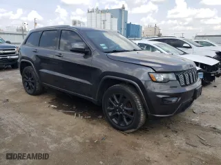 2018 Jeep Grand Cherokee Laredo E with VIN 1C4RJFAG6JC387334, listed as a Copart auction lot 64197034 with 57,992 mi miles and Salvage Title. Bid and sale history available at carsss.com. Image 4.