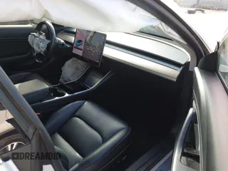 2018 Tesla Model 3 Long Range Battery with VIN 5YJ3E1EA1JF038751, listed as a IAAI auction lot 40553966 with 95,753 mi miles and . Bid and sale history available at DreamBid. Image 5.
