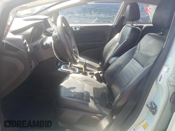 2017 Ford Fiesta Titanium with VIN 3FADP4FJ1HM143817, listed as a Copart auction lot 72231594 with 88,453 mi miles and Salvage Title. Bid and sale history available at DreamBid. Image 7.