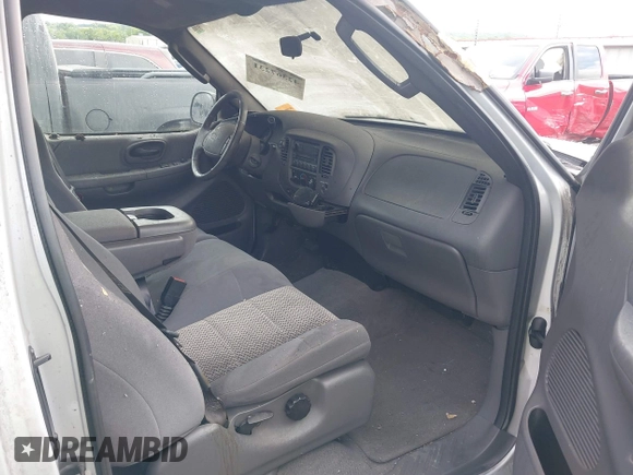 2003 Ford F-150 XL with VIN 1FTRX17W23NB29013, listed as a IAAI auction lot 42367231 with 95,067 mi miles and . Bid and sale history available at DreamBid. Image 5.