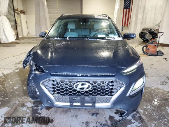 2019 Hyundai Kona Ultimate with VIN KM8K5CA50KU390434, listed as a Copart auction lot 41604145 with 74,743 mi miles and Salvage Title. Bid and sale history available at carsss.com. Image 5.